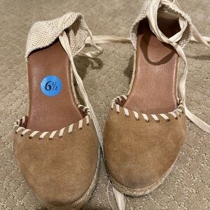 Cute brown wedge heels.